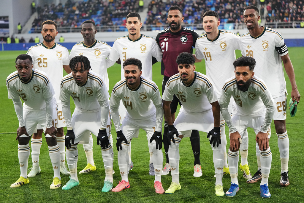 FILE - Saudi Arabia players pose for a team photo before the international friendly soccer match between Serbia and Saudi Arabia in Backa Topola, Serbia, Tuesday, March 31, 2026. (AP Photo/Darko Vojinovic, File)