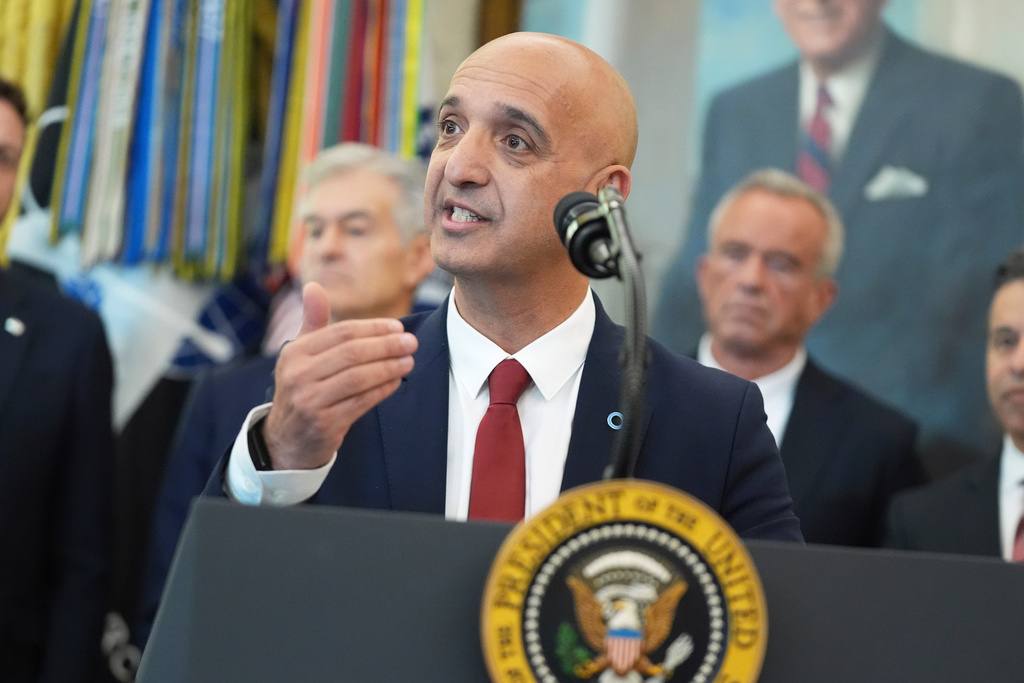Novo Nordisk President and CEO Mike Doustdar speaks during an event about drug prices with President Donald Trump, Thursday, Nov. 6, 2025, in the Oval Office of the White House in Washington. (AP Photo/Evan Vucci)