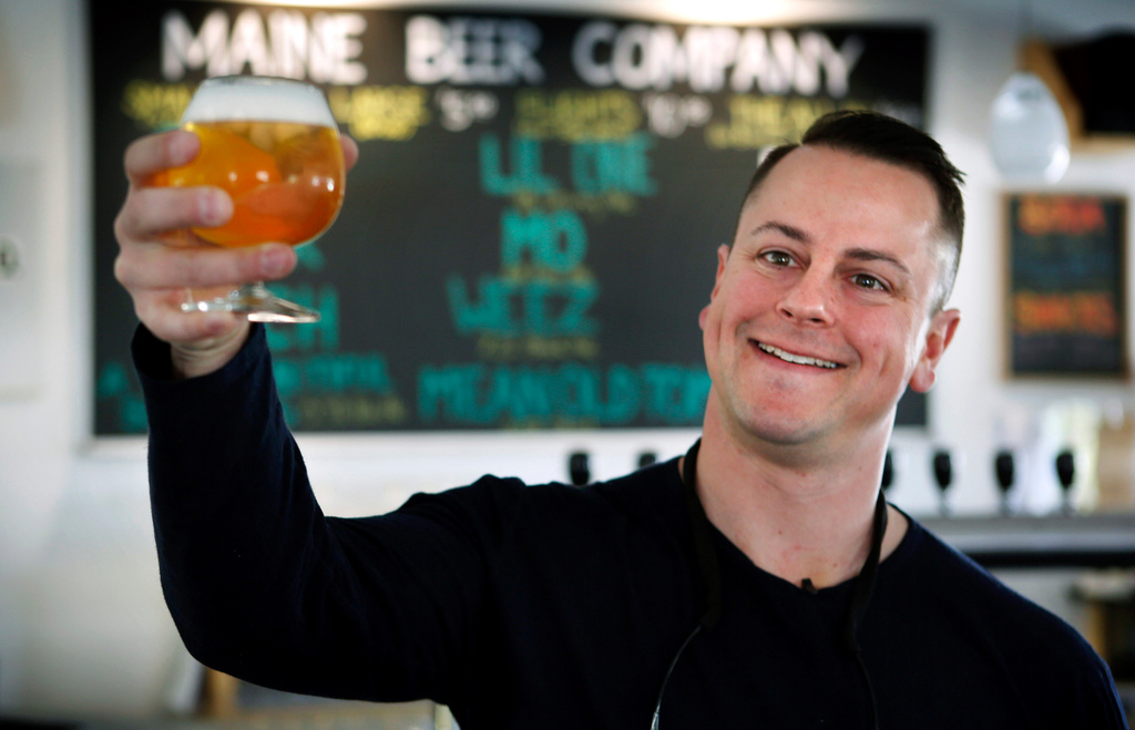 FILE - Dan Kleban, a co-owner of the Maine Beer Company, poses in the company's tasting room in Freeport, Maine, May 7, 2015. (AP Photo/Robert F. Bukaty, File)