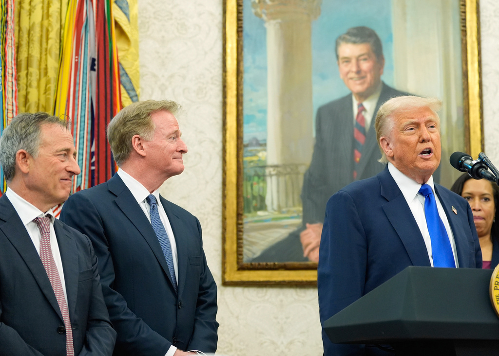 FILE - President Donald Trump speaks as Washington Commanders owner Josh Harris, from left, NFL Commissioner Roger Goodell and District of Columbia Mayor Muriel Bowser listen during an event in the Oval Office of the White House, May 5, 2025, in Washington. (AP Photo/Alex Brandon, File)