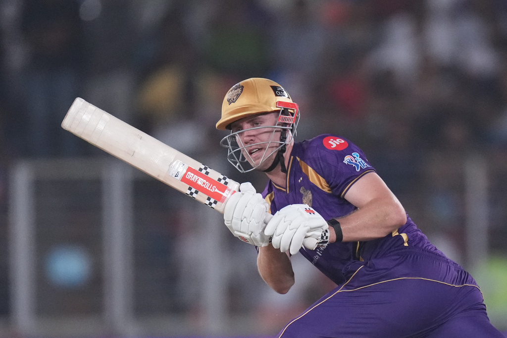 Kolkata Knight Riders' Cameron Green plays a shot during the Indian Premier League cricket match between Gujarat Titans and Kolkata Knight Riders in Ahmedabad, India, Friday, April 17, 2026. (AP Photo/Ajit Solanki)