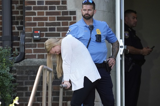A person walks out of the Annunciation Church's school as police respond to a reported mass shooting, Wednesday, Aug. 27, 2025, in Minneapolis. (AP Photo/Abbie Parr) A person walks out of the Annunciation Church's school as police respond to a reported mass shooting, Wednesday, Aug. 27, 2025, in Minneapolis. (AP Photo/Abbie Parr)