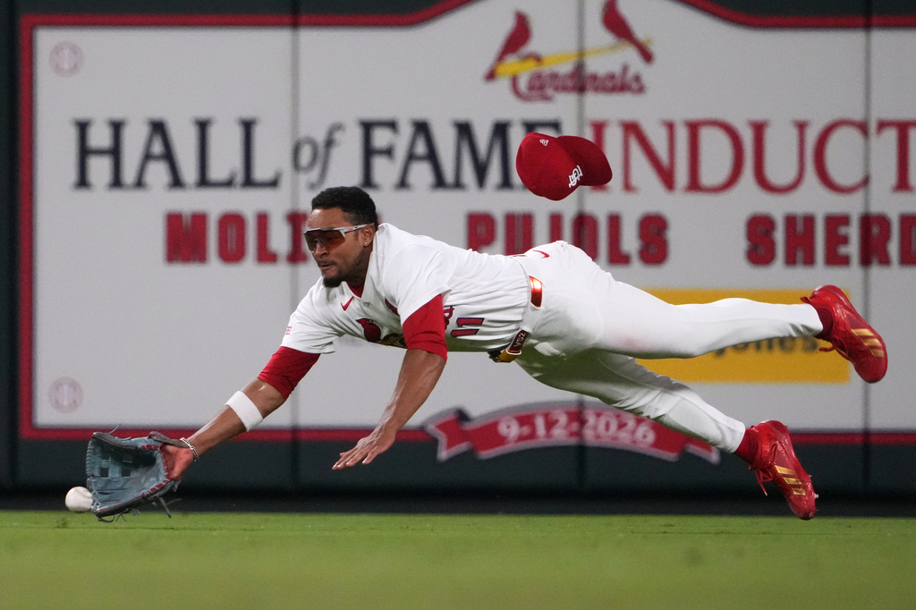 St. Louis Cardinals center fielder Victor Scott II is unable to catch a single by Pittsburgh Pirates' Endy Rodriguez during the sixth inning of a baseball game Wednesday, May 20, 2026, in St. Louis. (AP Photo/Jeff Roberson)