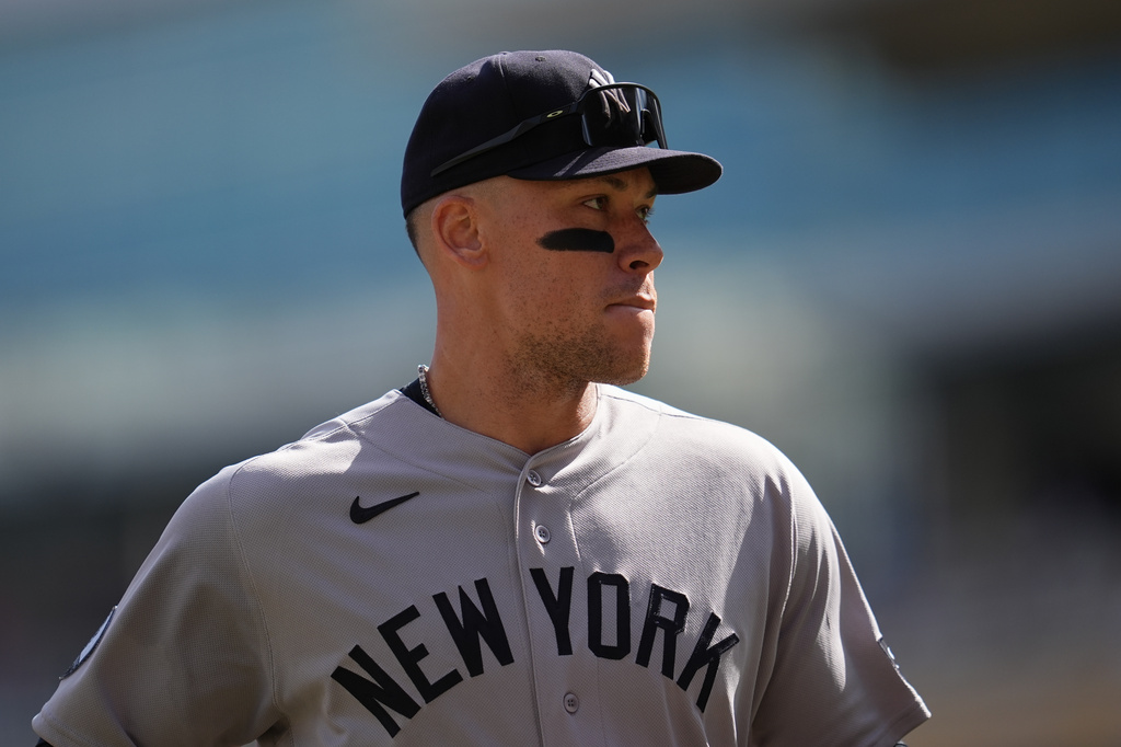 New York Yankees' Aaron Judge walks back to the dugout after the bottom of the fourth inning of a baseball game against the Minnesota Twins, Wednesday, Sept. 16, 2026, in Minneapolis. (AP Photo/Abbie Parr)