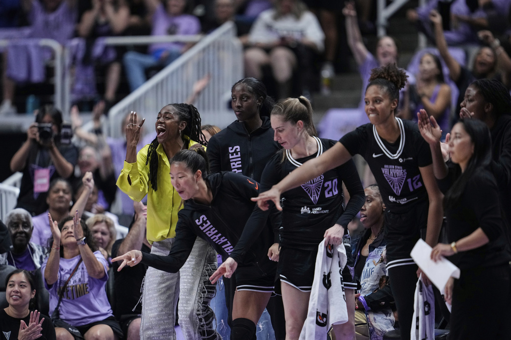 Golden State Valkyries players celebrate from the bench during the first half of Game 2 in the first round of the WNBA basketball playoffs against the Minnesota Lynx, Wednesday, Sept. 17, 2025, in San Jose, Calif. (AP Photo/Godofredo A. Vásquez)