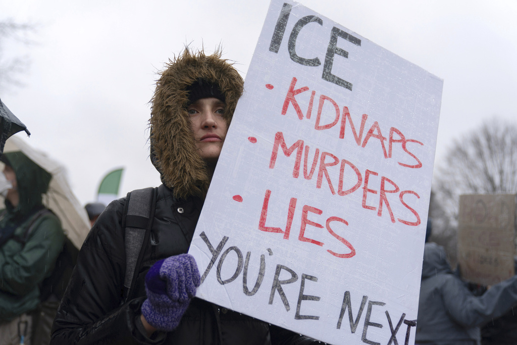 Demonstrators protest outside the White House in Washington, Saturday, Jan. 10, 2026, against the Immigration and Customs Enforcement agent who fatally shot Renee Good in Minneapolis. (AP Photo/Jose Luis Magana)