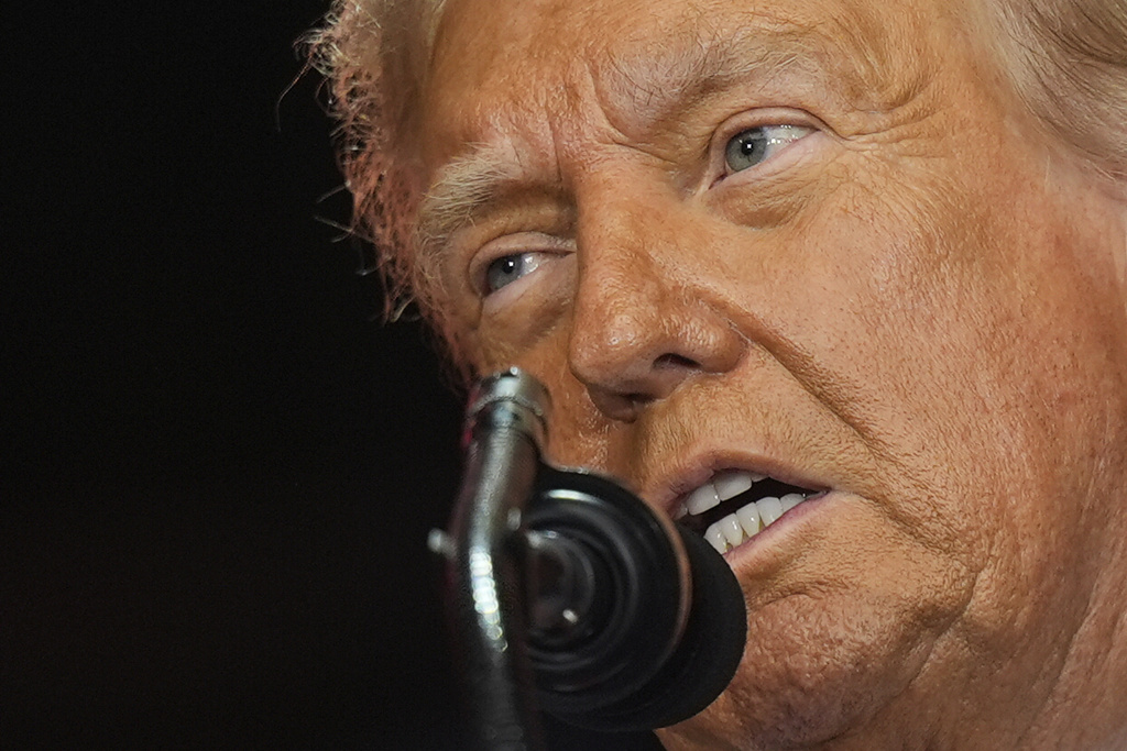 President Donald Trump speaks at a memorial for conservative activist Charlie Kirk, Sunday, Sept. 21, 2025, at State Farm Stadium in Glendale, Ariz. (AP Photo/Julia Demaree Nikhinson)