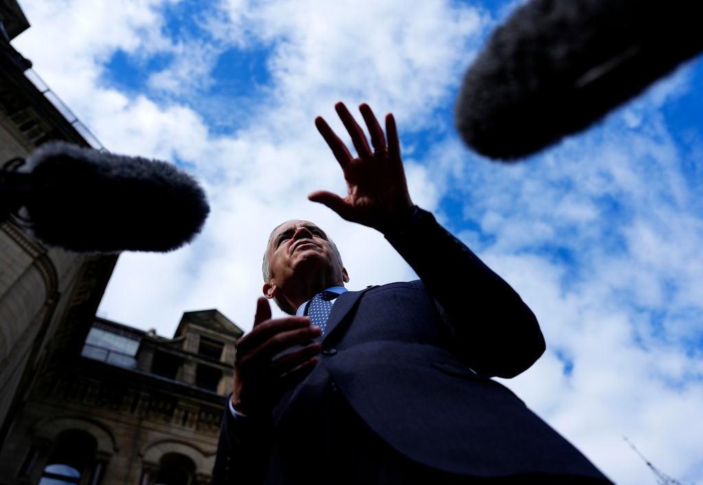 Prime Minister Mark Carney speaks to journalists as he arrives at the Office of the Prime Minister and Privy Council in Ottawa, Canada, Tuesday, Sept. 1, 2026. (Justin Tang/The Canadian Press via AP)