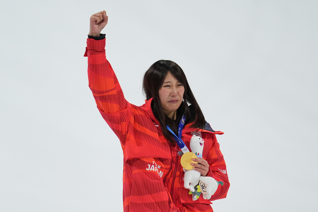 Gold medalist Japan's Kokomo Murase celebrates winning the women's snowboarding big air finals at the 2026 Winter Olympics, in Livigno, Italy, Monday, Feb. 9, 2026. (AP Photo/Abbie Parr)