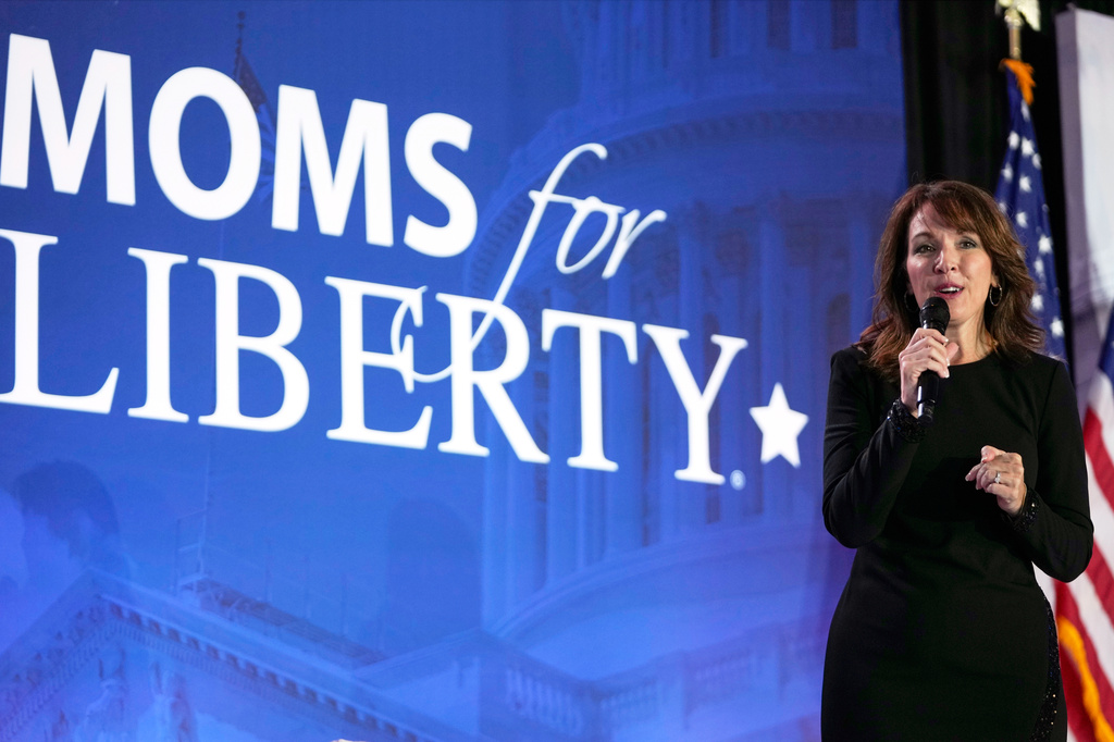 FILE - Moms for Liberty co-founder Tina Descovich speaks before Republican presidential nominee former President Donald Trump at the Moms for Liberty annual convention in Washington, Aug. 30, 2024. (AP Photo/Mark Schiefelbein, File)