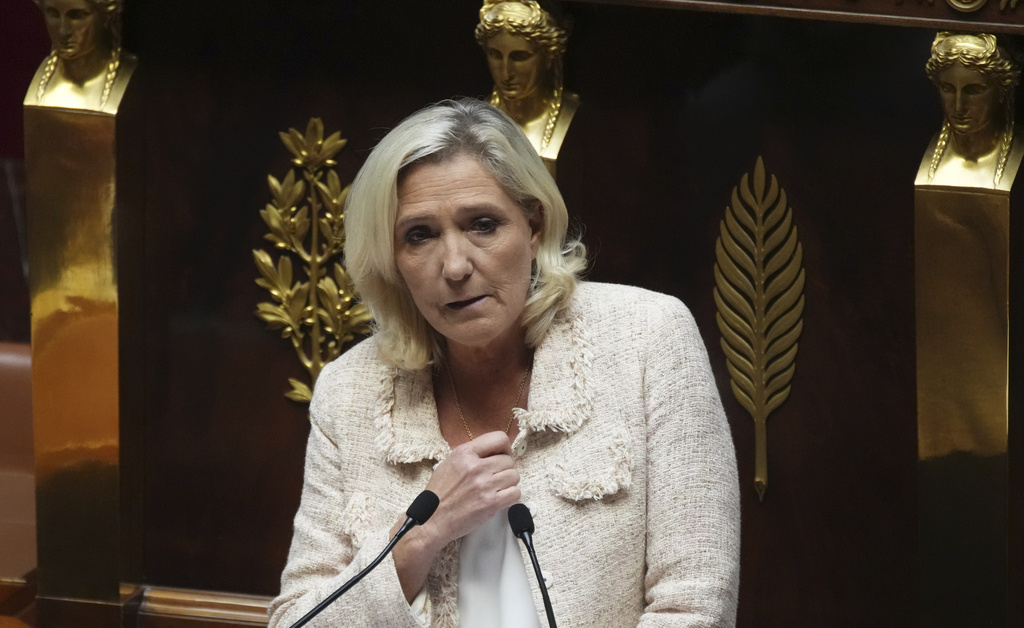 French far-right leader Marine Le Pen addresses the National Assembly, prior to a parliamentary confidence vote of French Prime Minister Francois Bayrou that could bring him down, in Paris, France, Monday, Sept. 8, 2025. (AP Photo/Christophe Ena)