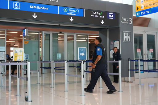 A Transportation Security Administration worker heads into the east security checkpoint in Denver International Airport Thursday, Oct. 2, 2025, in Denver. (AP Photo/David Zalubowski) A Transportation Security Administration worker heads into the east security checkpoint in Denver International Airport Thursday, Oct. 2, 2025, in Denver. (AP Photo/David Zalubowski)