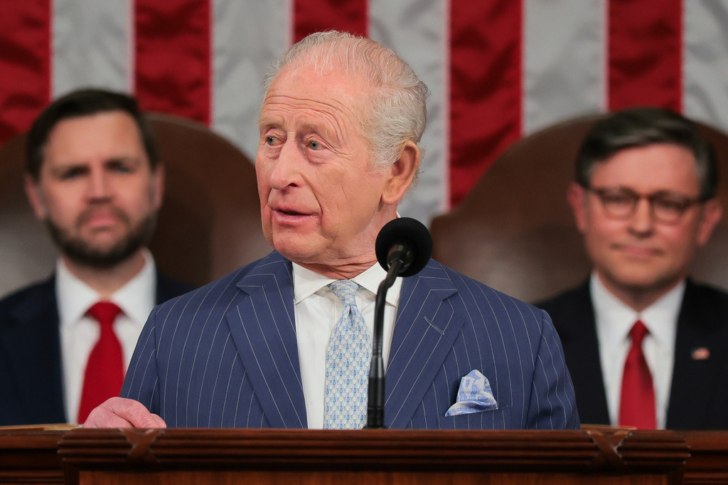 Britain's King Charles III addresses a joint meeting of Congress while Vice President JD Vance, left, and House Speaker Mike Johnson, R-La., right, listen in the House Chamber of the U.S. Capitol in Washington, Tuesday, April 28, 2026. (Kylie Cooper/Pool via AP)