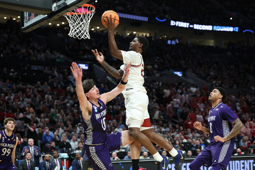 Arkansas forward Billy Richmond III shoots during the first half in the second round of the NCAA college basketball tournament against High Point, Saturday, March 21, 2026, in Portland, Ore. (AP Photo/Craig Mitchelldyer)