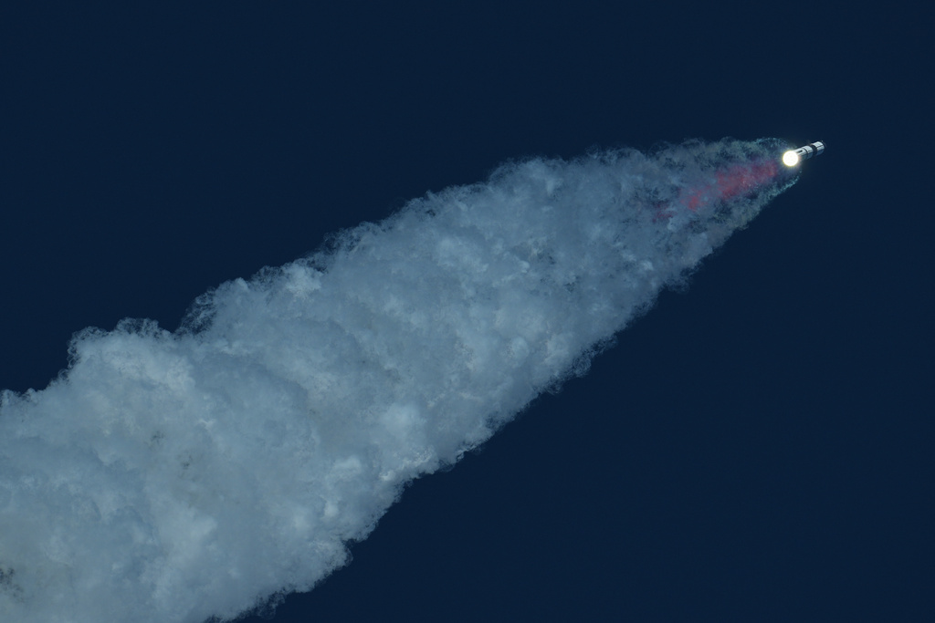 SpaceX's mega rocket Starship makes a test flight from Starbase, Texas, Monday, Oct. 13, 2025. (AP Photo/Eric Gay)