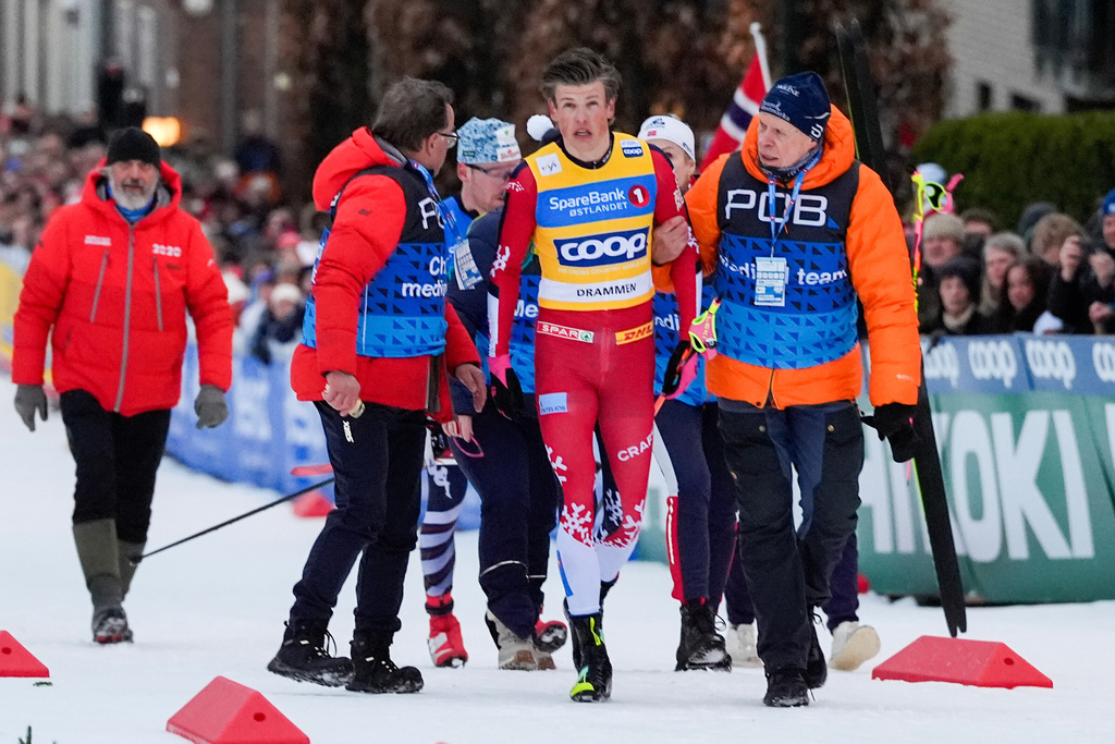 Norway's Johannes Hoesflot Klaebo walks after a fall during the World Cup sprint cross-country race in Drammen, Norway, Thursday March 12, 2026. (Lise Aserud/NTB Scanpix via AP)