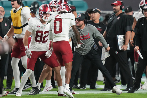 Stanford wide receiver Caden High (0) is congratulated after scoring a touchdown during the first half of an NCAA college football game against Miami, Saturday, Oct. 25, 2025, in Miami Gardens, Fla. (AP Photo/Lynne Sladky) Stanford wide receiver Caden High (0) is congratulated after scoring a touchdown during the first half of an NCAA college football game against Miami, Saturday, Oct. 25, 2025, in Miami Gardens, Fla. (AP Photo/Lynne Sladky)