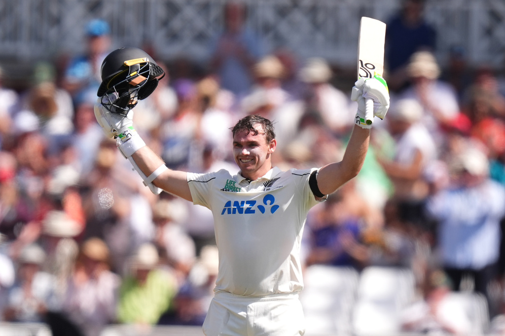 New Zealand's Tom Latham celebrates reaching a century, during day one of the Third Test cricket match between England and New Zealand, in Nottingham, England, Thursday June 25, 2026. (Mike Egerton/PA via AP)