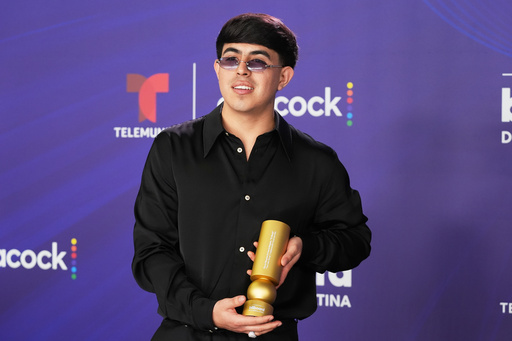 Oscar Maydon poses with the Hot Latin Song Award at the Latin Billboard Awards Thursday, Oct. 23, 2025, in Miami. (AP Photo/Marta Lavandier) Oscar Maydon poses with the Hot Latin Song Award at the Latin Billboard Awards Thursday, Oct. 23, 2025, in Miami. (AP Photo/Marta Lavandier)