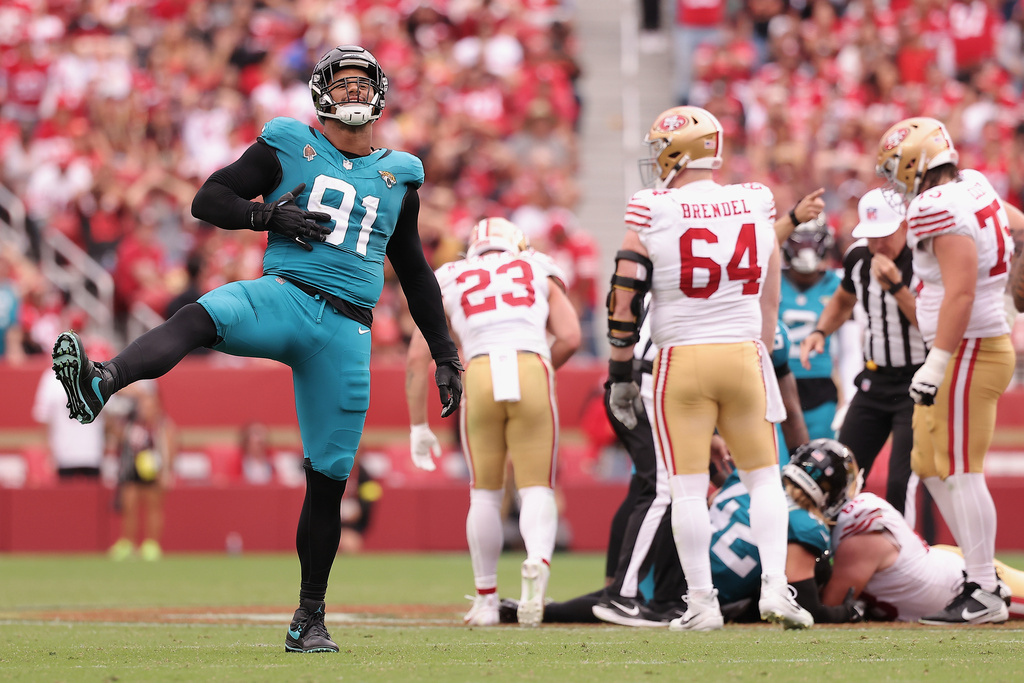 Jacksonville Jaguars defensive tackle Arik Armstead (91) celebrates after sacking San Francisco 49ers quarterback Brock Purdy and forcing a fumble, which the Jaguars recovered, during the second half of an NFL football game in Santa Clara, Calif., Sunday, Sept. 28, 2025. (AP Photo/Kelley L. Cox)