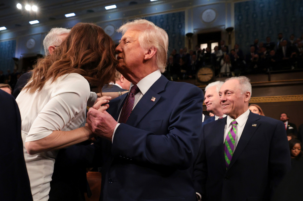 FILE - President Donald Trump embraces Rep. Nancy Mace, R-S.C., as he arrives to address a joint session of Congress at the Capitol in Washington, March 4, 2025. (Win McNamee/Pool Photo via AP, File)