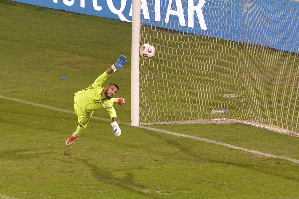 Armenia's goalkeeper Henri Avagyan fails to save the shot from Portugal's Cristiano Ronaldo during a World Cup 2026 group F qualifying soccer match between Armenia and Portugal at the Vazgen Sargsyan stadium in Yerevan, Armenia, Saturday, Sept. 6, 2025. (AP Photo/Hakob Berberyan)