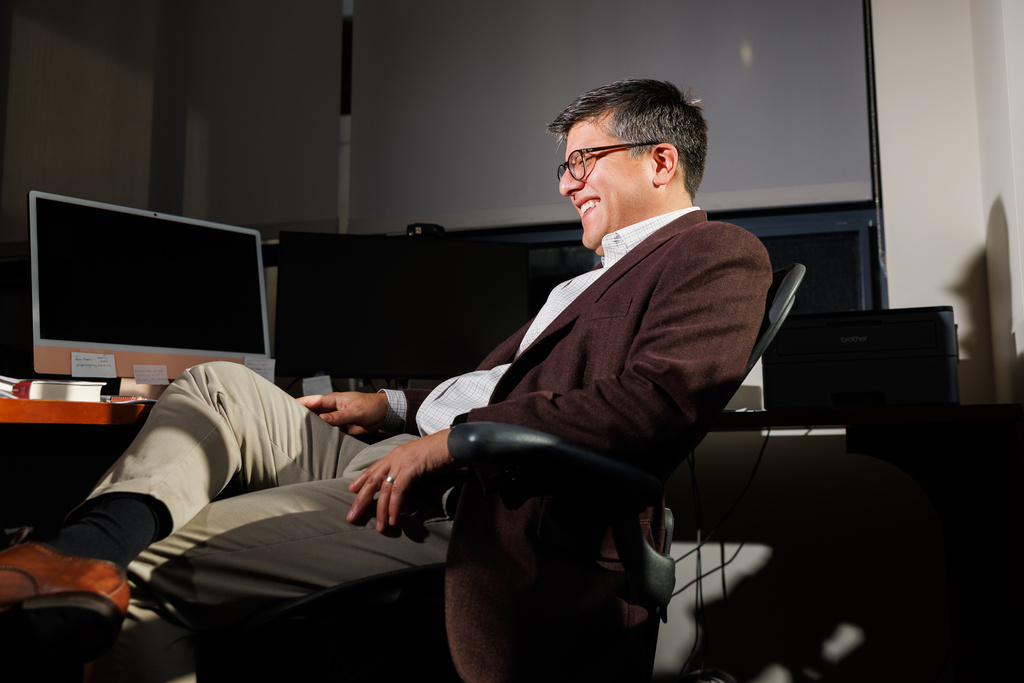 Juan Espinoza, vice provost for enrollment management at Virginia Tech, poses for a photo in his office, Nov. 12, 2025, in Blacksburg, Va. (AP Photo/Shaban Athuman)