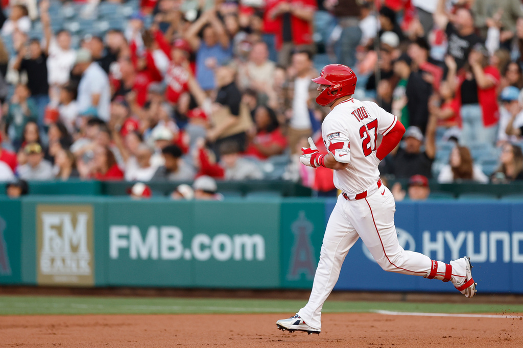 Los Angeles Angels' Mike Trout rounds the bases after hitting a two-run home run during the first inning of a baseball game against the Texas Rangers, Saturday, May 23, 2026, in Anaheim, Calif. (AP Photo/Caroline Brehman)