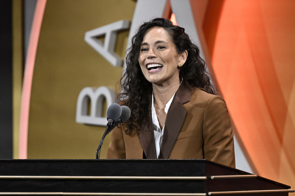 Sue Bird speaks during her enshrinement in the Basketball Hall of Fame, Saturday, Sept. 6, 2025, in Springfield, Mass. (AP Photo/Jessica Hill)