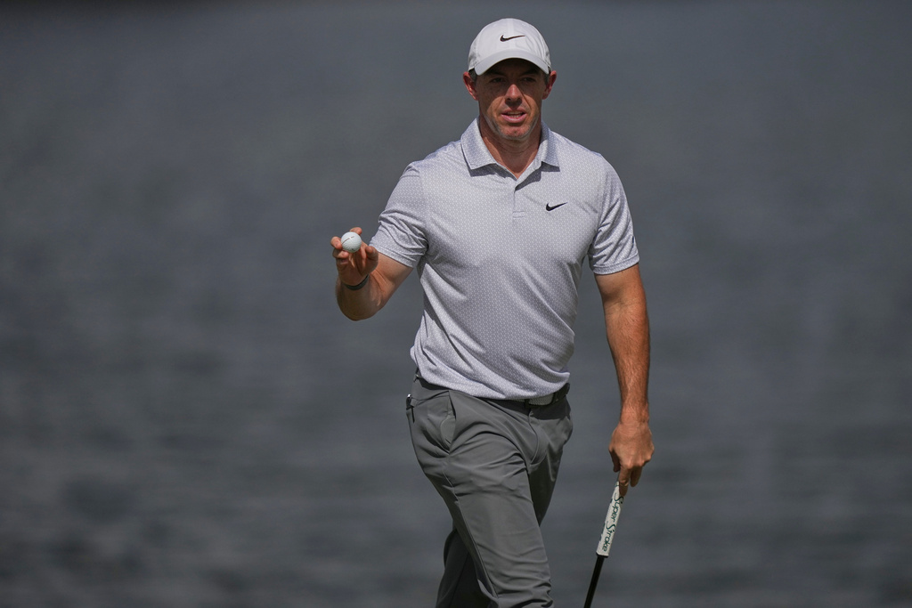 Rory McIlroy, of Northern Ireland, acknowledges the gallery after his shot on the sixth green during the first round of the Arnold Palmer Invitational at Bay Hill golf tournament Thursday, March 5, 2026, in Orlando, Fla. (AP Photo/Matt Slocum)