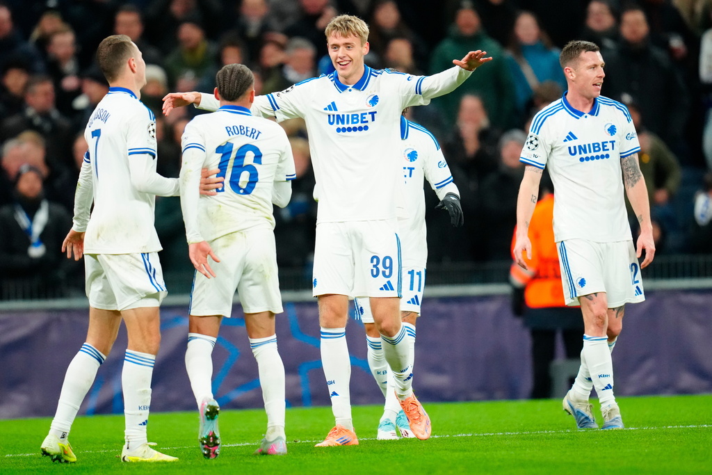 Copenhagen's Viktor Dadason, center, celebrates after scoring the opening goal during the Champions League opening phase soccer match between FC Copenhagen and Kairat Almaty in Copenhagen, Denmark, Wednesday, Nov. 26, 2025. (Ida Marie Odgaard/Ritzau Scanpix via AP)