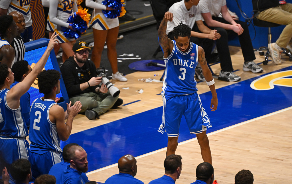 Duke's Isaiah Evans (3) reacts after a 3-point basket in the second half of an NCAA college basketball game against Pittsburgh in Pittsburgh, Tuesday, Feb. 10, 2026. (AP Photo/Justin Berl)