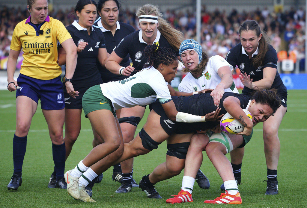 New Zealand's Kaipo Olsen-Baker scores their side's fifth try of the game during the Women's Rugby World Cup 2025 quarter-final match at Sandy Park, Exeter, England, Saturday Sept. 13, 2025. (Ben Birchall/PA via AP)