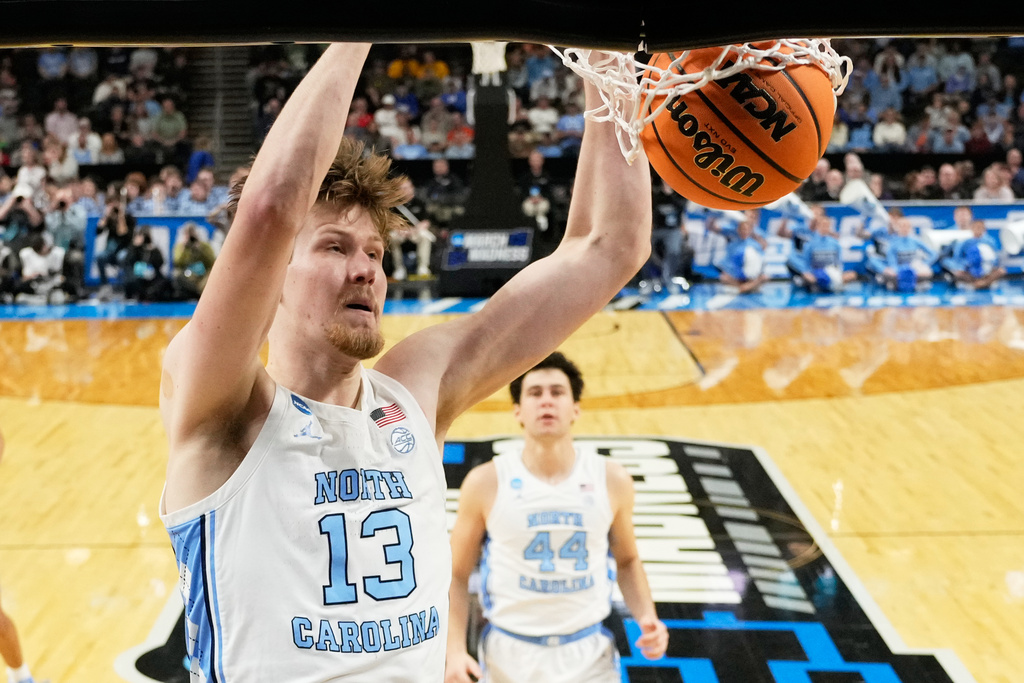 North Carolina center Henri Veesaar dunks against VCU during the first half in the first round of the NCAA college basketball tournament, Thursday, March 19, 2026, in Greenville, S.C. (AP Photo/Chris Carlson)