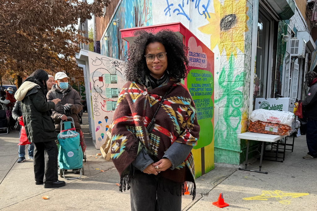 Yoly Nuñez stands outside of Collective Focus Resource Hub, a mutual aid group in Brooklyn, New York, Nov. 18, 2025. (AP Photo/Thalia Beaty)