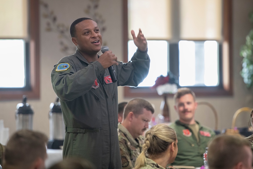 In this photo provided by the U.S. Air National Guard, U.S. Air Force Tech. Sgt. Tyler Simmons, a boom operator assigned to the Ohio National Guard's 121st Air Refueling Wing in Columbus, Ohio, speaks during the Enlisted Leadership Symposium at Youngstown Air Reserve Station in Youngstown, Ohio, on June 27, 2023. (Airman 1st Class Nicholas Battani/U.S. Air National Guard via AP)