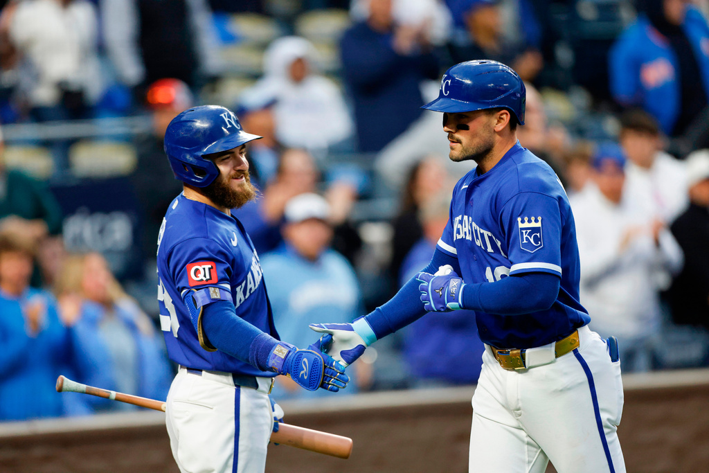 Kansas City Royals' Michael Massey, celebrates his two-run home run with Kyle Isbel, left, during the fourth inning of a baseball game against the Cleveland Guardians in Kansas City, Mo., Tuesday, May 5, 2026. (AP Photo/Colin E. Braley)