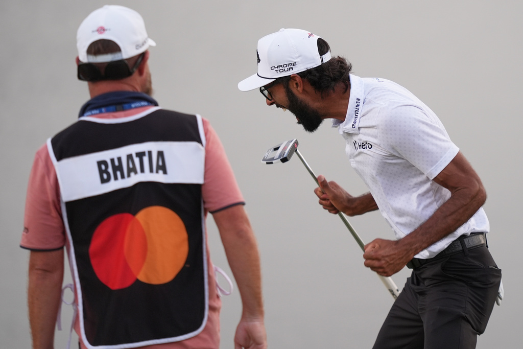 Akshay Bhatia, right, reacts after winning his playoff against Daniel Berger at the Arnold Palmer Invitational at Bay Hill golf tournament Sunday, March 8, 2026, in Orlando, Fla. (AP Photo/Matt Slocum)