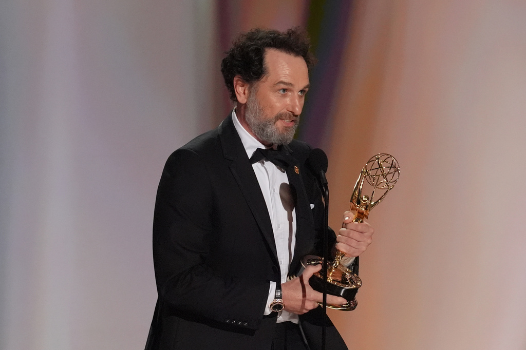 Matthew Rhys accepts the award for outstanding lead actor in a limited or anthology series or movie for "The Beast In Me" during the 78th Emmy Awards on Monday, Sept. 14, 2026, at the Peacock Theater in Los Angeles. (AP Photo/Chris Pizzello)