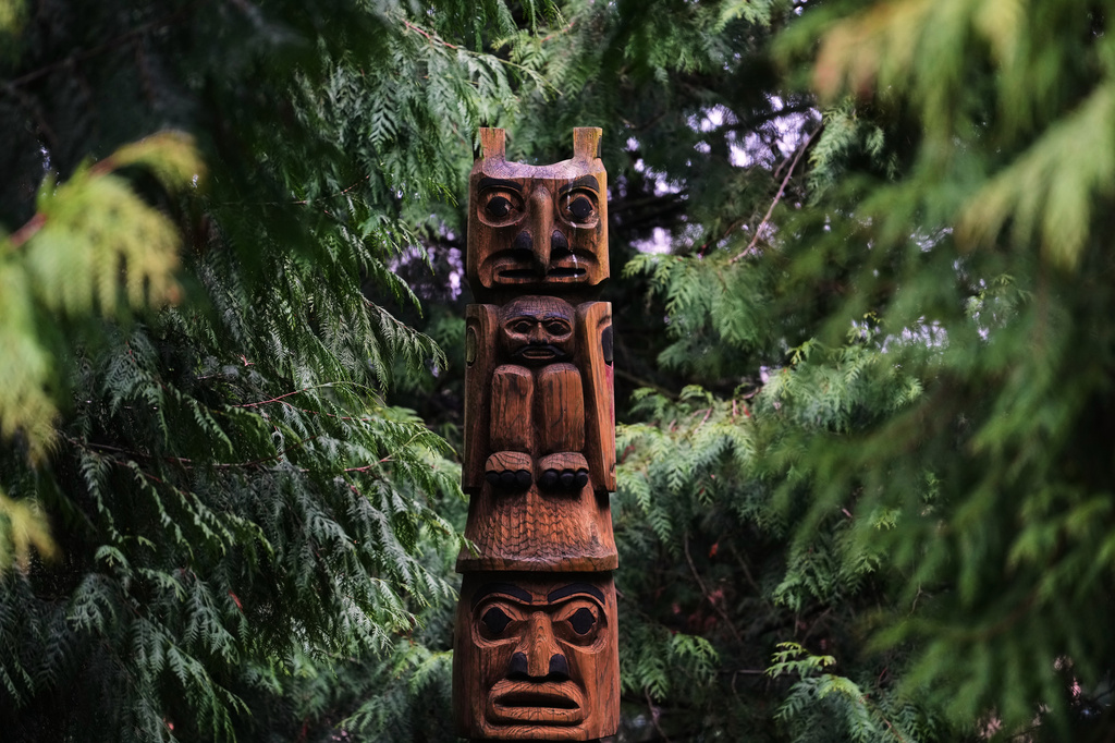 A story pole is seen in the middle of a sacred circle at the center of campus at Chief Leschi Schools, which has improved its graduation rates with a career and technical education program, Wednesday, March 18, 2026, in Puyallup, Wash. (AP Photo/Lindsey Wasson)