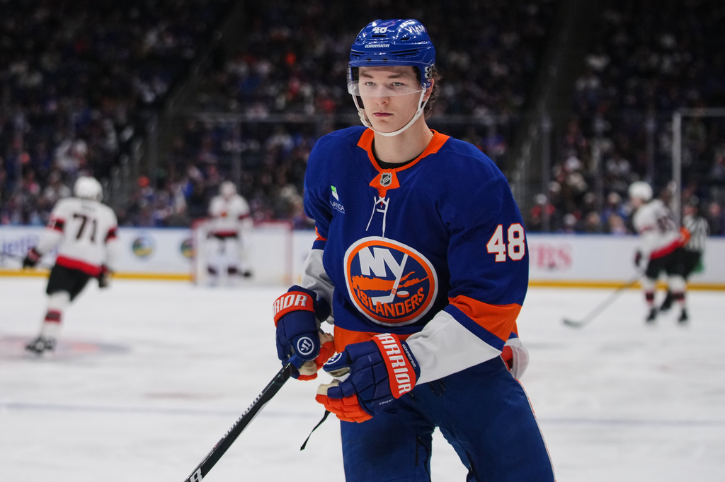 New York Islanders' Matthew Schaefer (48) skates during the third period of an NHL hockey game against the Ottawa Senators Saturday, April 11, 2026, in Elmont, N.Y. (AP Photo/Frank Franklin II)