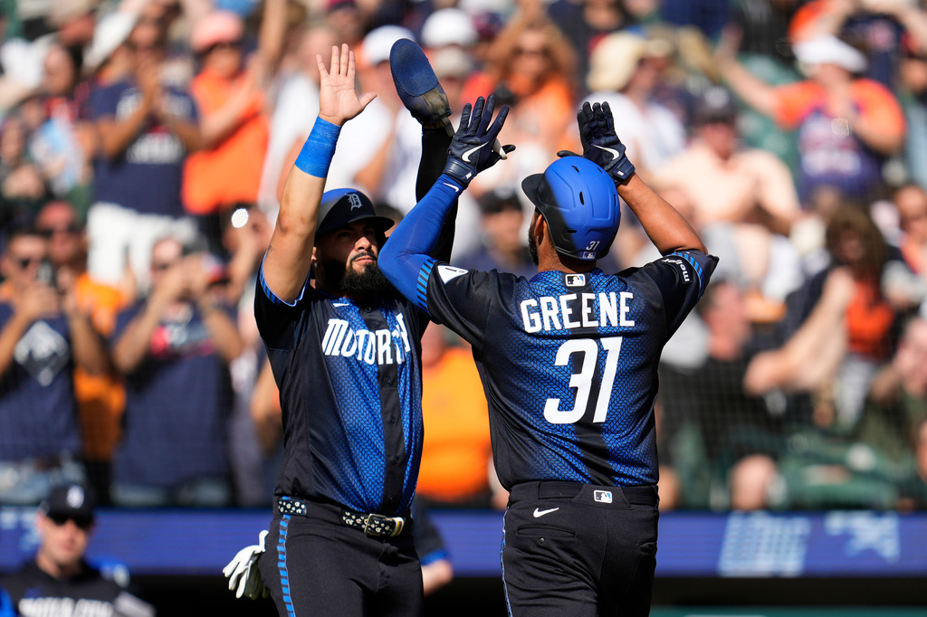 Detroit Tigers' Riley Greene (31) celebrates his two-run home run with Gleyber Torres, left, during the fifth inning of a baseball game against the Minnesota Twins, Monday, Sept. 7, 2026, in Detroit. (AP Photo/Paul Sancya)