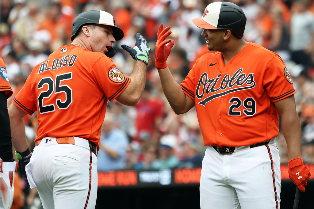 Baltimore Orioles' Pete Alonso (25) celebrates with teammate Samuel Basallo (29) after hitting a home run during the first inning of a baseball game against the Washington Nationals, Sunday, June 28, 2026, in Baltimore. (AP Photo/Daniel Kucin Jr.)