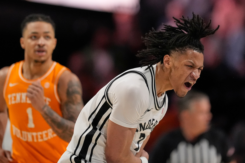 Vanderbilt guard Chandler Bing (7) celebrates a basket during the first half of an NCAA college basketball game against Tennessee, Saturday, Feb. 21, 2026, in Nashville, Tenn. (AP Photo/George Walker IV)