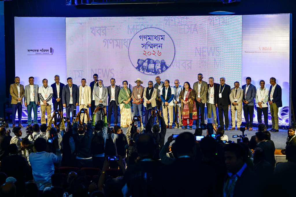 Journalists, editors and owners of media outlets gather at a conference demanding protection after recent attacks on two major newspapers in Dhaka, Bangladesh, Saturday, Jan. 17, 2026. (AP Photo/Mahmud Hossain Opu)