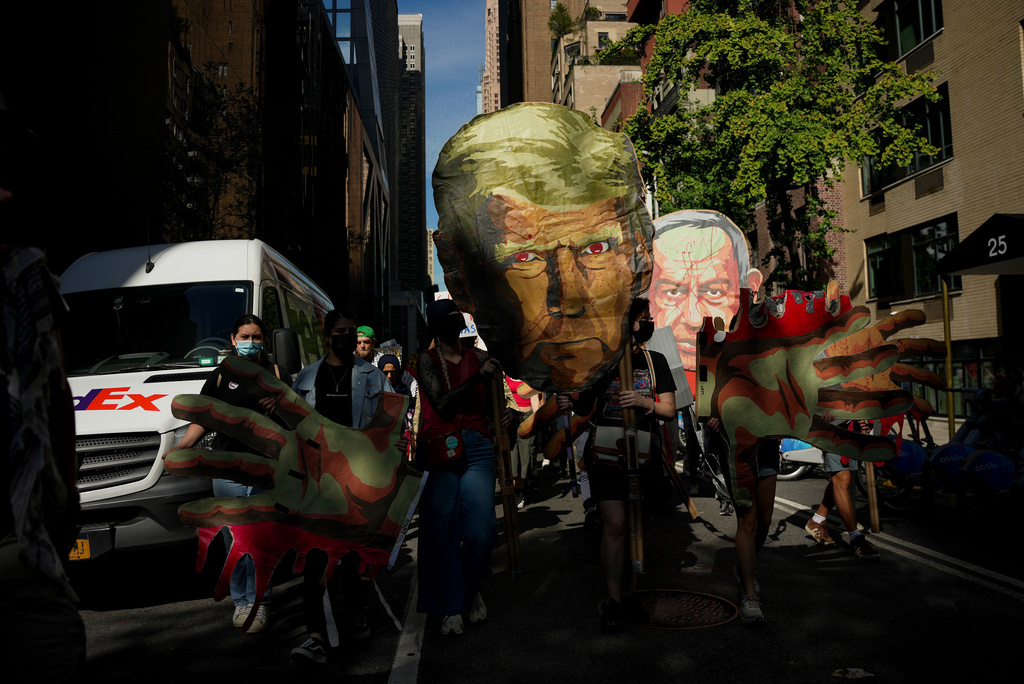 People march down 54th Street during a pro-Palestinian demonstration, Friday, Sept. 26, 2025, in New York. (AP Photo/Angelina Katsanis)