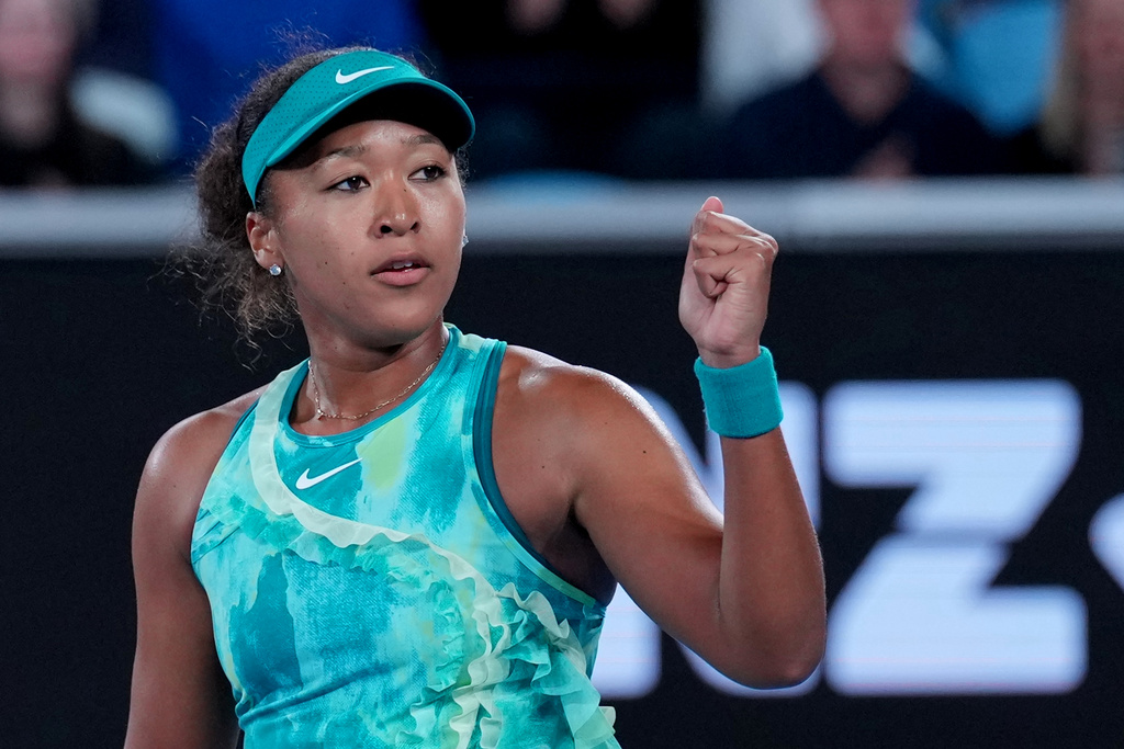 Naomi Osaka of Japan reacts after defeating Sorana Cirstea of Romania in their second round match at the Australian Open tennis championship in Melbourne, Australia, Thursday, Jan. 22, 2026. (AP Photo/Dita Alangkara)