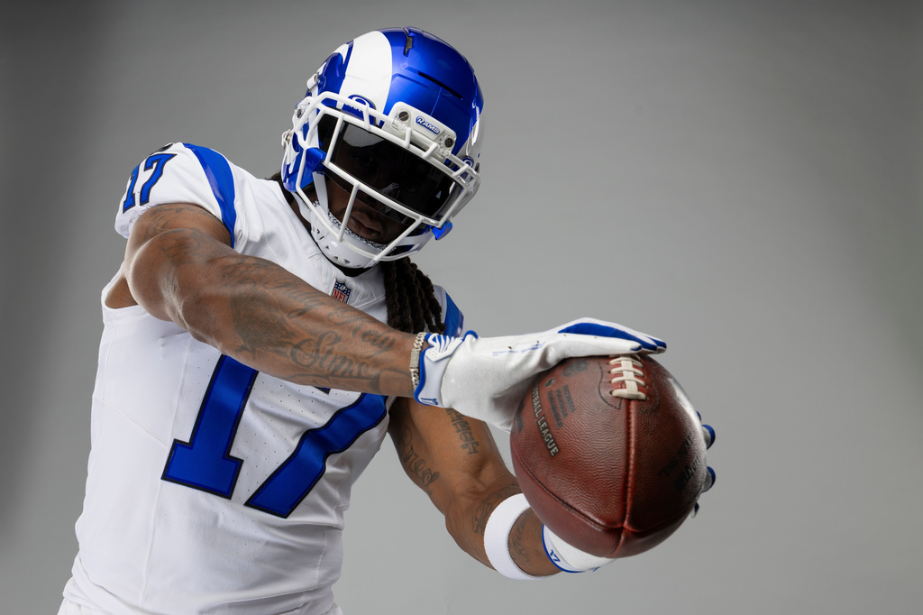 This undated photo provided by the Los Angeles Rams, Thursday, July 23, 2026, shows wide receiver Davante Adams posing in Los Angeles while wearing the Rams’ new “Fearsome White” alternate uniform. (Brevin Townsell/Los Angeles Rams via AP)