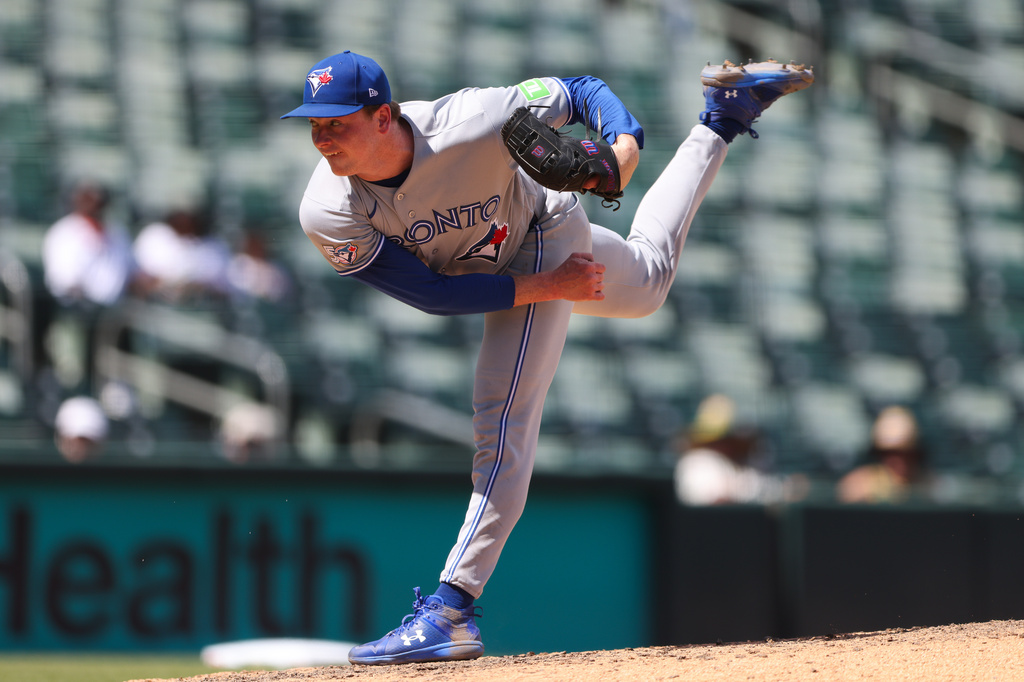 Toronto Blue Jays pitcher Louis Varland throws to an Athletics batter during the eighth inning of a baseball game Wednesday, Sept. 9, 2026, in West Sacramento, Calif. (AP Photo/Scott Marshall)