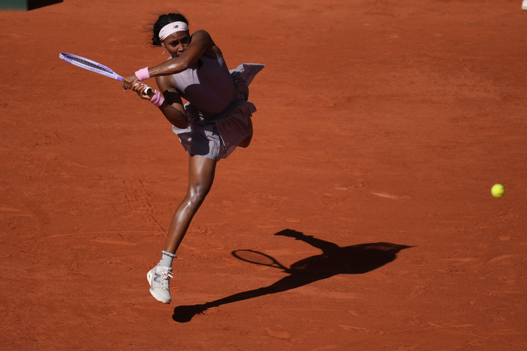 Coco Gauff of the U.S. returns to Taylor Townsend of the U.S. during their first round women's singles tennis match at the French Open tennis tournament in Paris, Tuesday, May 26, 2026. (AP Photo/Christophe Ena)